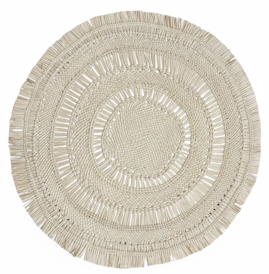 Round woven mat with concentric circles and tassels on a white background