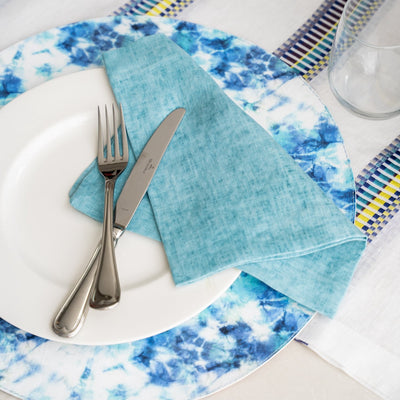 Adorn your table in the colors of paradise with the Eden placemats. Wipeable and reversible, these easy-to-clean placemats offer two distinct palettes for maximum versatility.